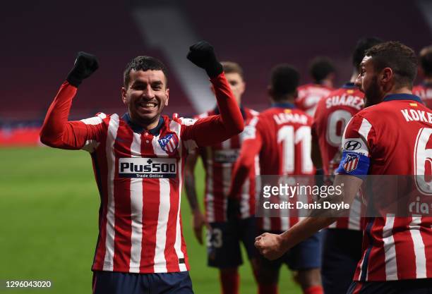 Angel Correa of Atletico de Madrid celebrates after scoring their team's first goal during the La Liga Santander match between Atletico de Madrid and...
