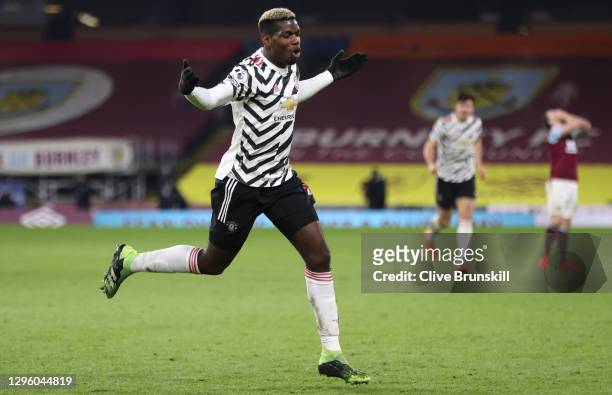 Paul Pogba of Manchester United celebrates after scoring their team's first goal during the Premier League match between Burnley and Manchester...