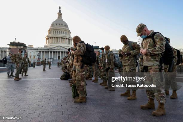 Members of the U.S. National Guard arrive at the U.S. Capitol on January 12, 2021 in Washington, DC. The Pentagon is deploying as many as 15,000...