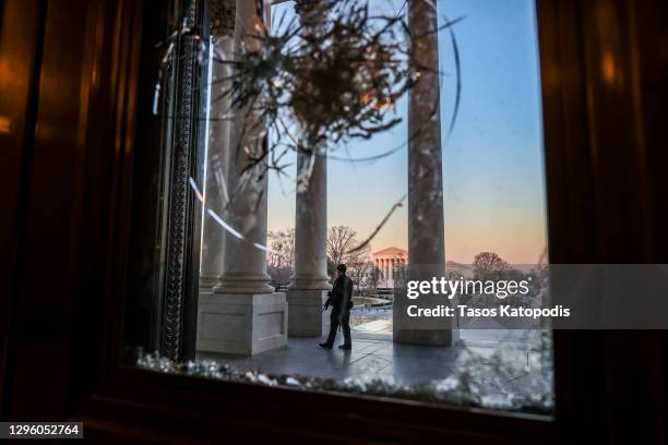 Capitol Police stand guard at the entrance to the U.S. Capitol on January 12, 2021 in Washington, DC. The Pentagon is deploying as many as 15,000...