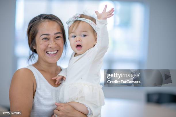 waving hi - mom waving hi stock pictures, royalty-free photos & images