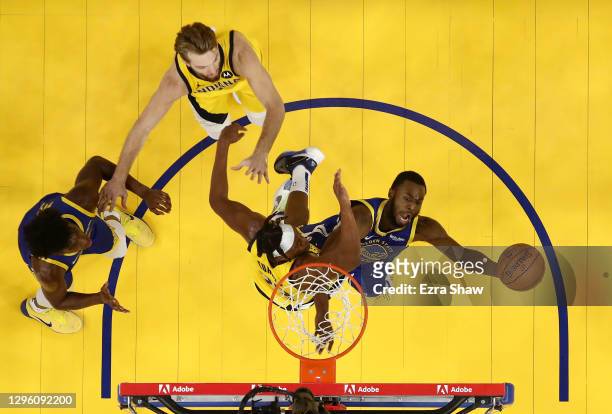 Andrew Wiggins of the Golden State Warriors goes up for a shot on Myles Turner of the Indiana Pacers at Chase Center on January 12, 2021 in San...