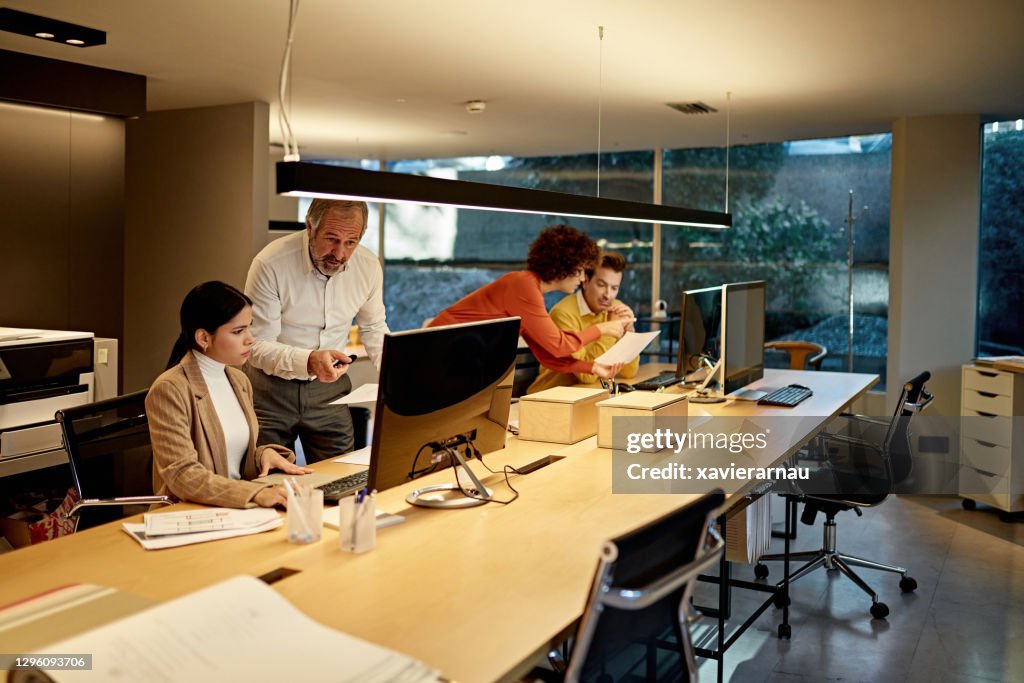Diverse Design Team Working At Computer Monitors High-Res Stock Photo ...