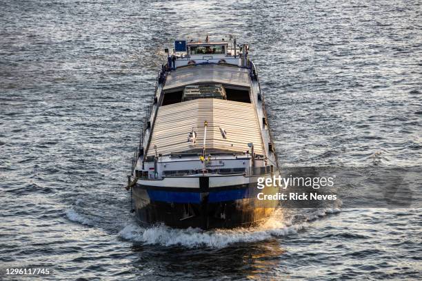 barge boat sailing in rhine river, germany - barge stock pictures, royalty-free photos & images