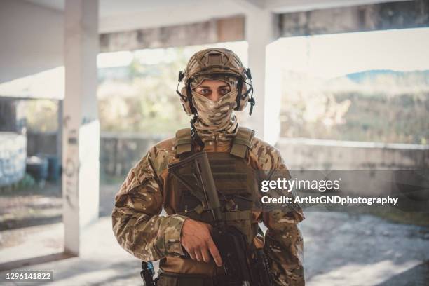 portrait of soldier on mission. - soldered stock pictures, royalty-free photos & images