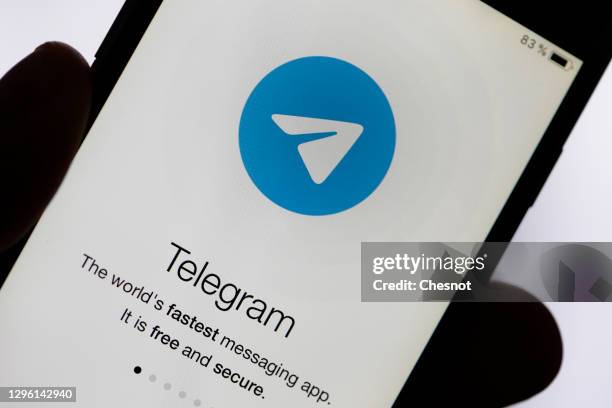 In this photo illustration, the logo of the social media application Telegram is displayed on the screen of an iPhone on January 13, 2021 in Paris,...