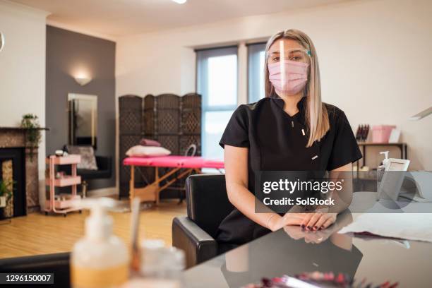 being a nail technician during pandemic - nail salon stock pictures, royalty-free photos & images