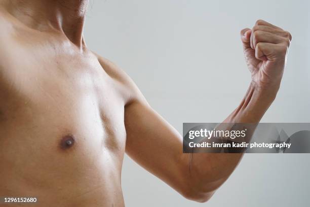chest and arms on close up shot - torace umano foto e immagini stock