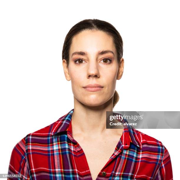 portrait of a young woman wearing plaid shirt - blank expression imagens e fotografias de stock