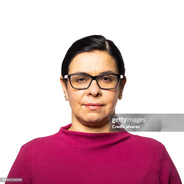 portrait of a confident mature woman - blank expression stock pictures, royalty-free photos & images