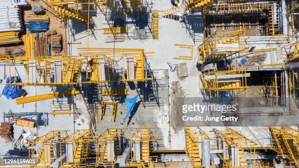 aerial view construction engineer working at construction site - construction crane asia stock pictures, royalty-free photos & images