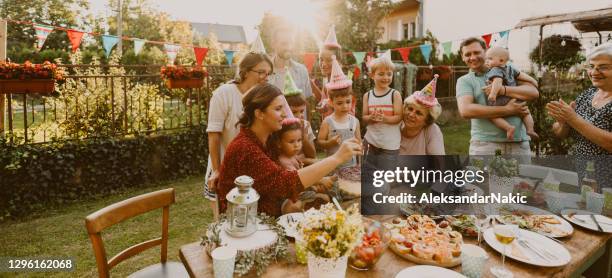 an outdoors birthday party - birthday stock pictures, royalty-free photos & images