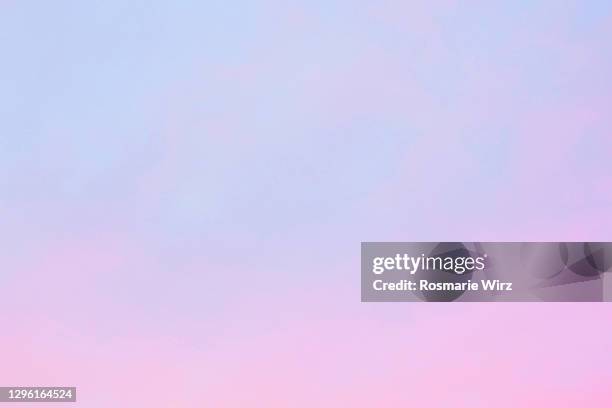 sky above: from pink to pale blue gradient - purple sky fotografías e imágenes de stock