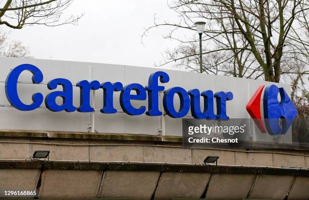 Carrefour logo sits on the facade of a Carrefour supermarket on January 13, 2021 in Paris, France. French retailer Carrefour today confirmed "very...