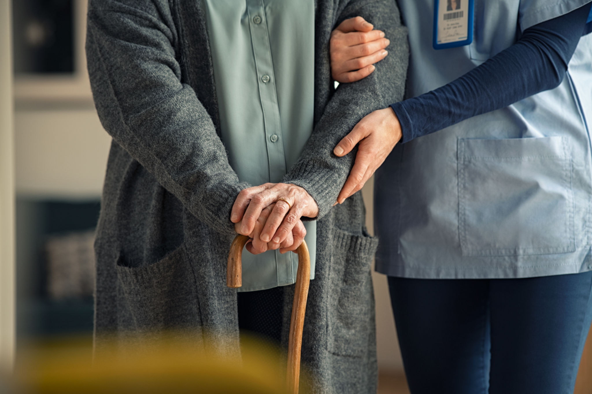 nurse helping senior
