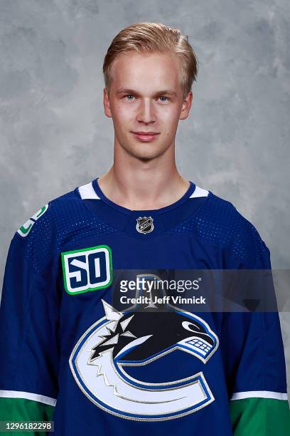 Elias Pettersson of the Vancouver Canucks poses for his official headshot for the 2020-2021 season on September 12, 2019 at Rogers Arena in...