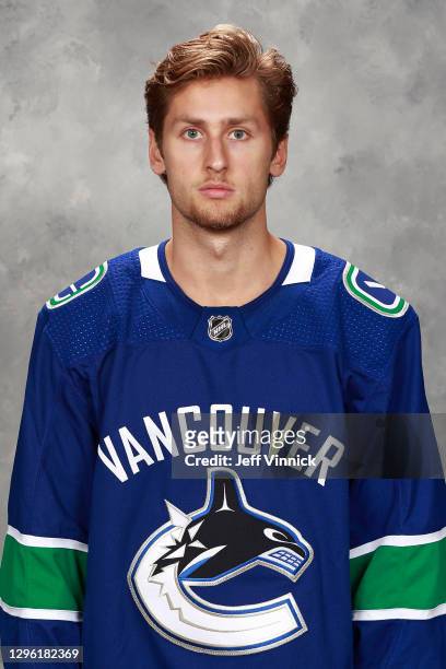 Guillaume Brisebois of the Vancouver Canucks poses for his official headshot for the 2020-2021 season on September 13, 2018 at Rogers Arena in...