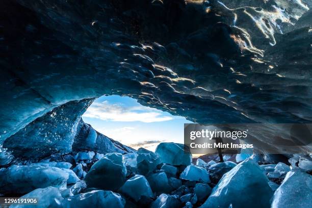 glacial ice cave, svinafellsjokull glacier, skaftafell national park, iceland - man open mouth stock pictures, royalty-free photos & images