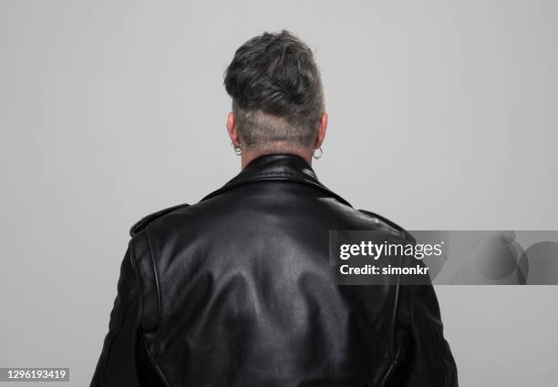 rear view of mature man - man jacket stock pictures, royalty-free photos & images