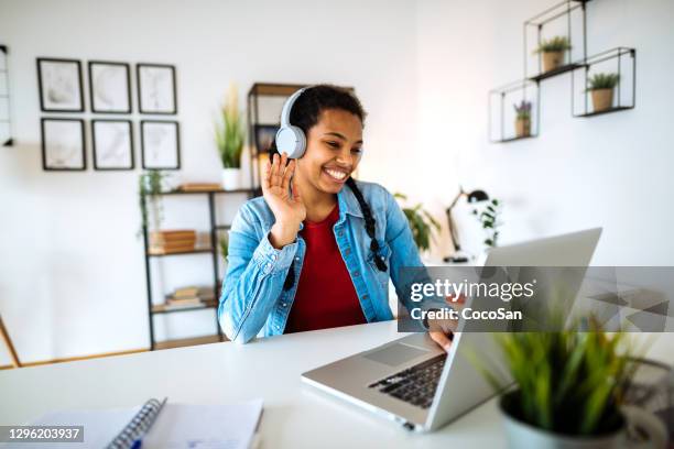 african-american gen-z woman studying at home during covid-19 quarantine. homeschooling, distance learning and working at home - z com stock pictures, royalty-free photos & images