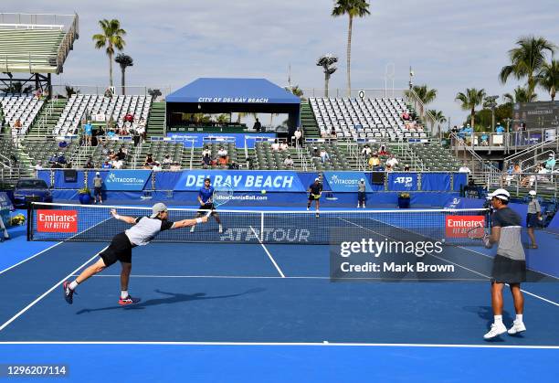 Ariel Behar of Uruguay and Gonzalo Escobar of Ecuador in action against brothers Ryan and Christian Harrison during the Doubles Finals of the Delray...