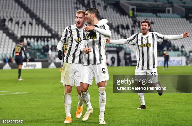 Alvaro Morata of Juventus F.C. Is congratulated by teammates Dejan Kulusevski and Manolo Portanova as he celebrates after scoring their team's second...