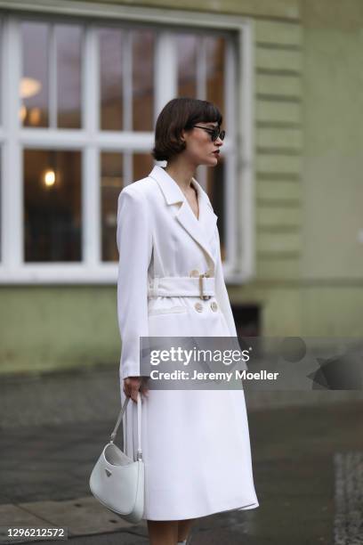 Lea Naumann wearing Prada Cleo bag, Nobi Talai beige coat on January 12, 2021 in Berlin, Germany.