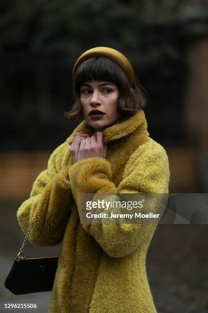 Lea Naumann wearing Fassbender coat and Marzoline Milano hairband on January 12, 2021 in Berlin, Germany.