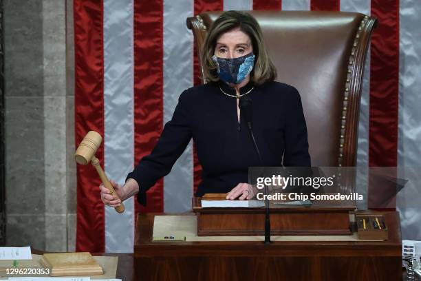 Speaker of the House Nancy Pelosi raps her gavel after the House voted to impeach U.S. President Donald Trump for the second time in little over a...