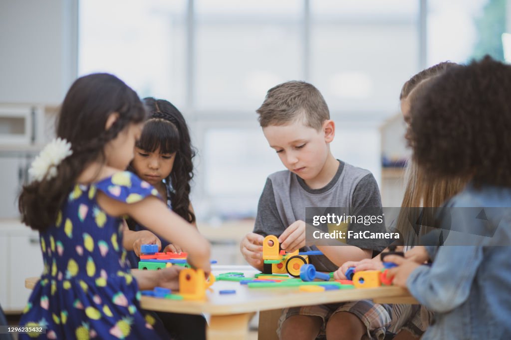 Teamwork To Build Together High-Res Stock Photo - Getty Images