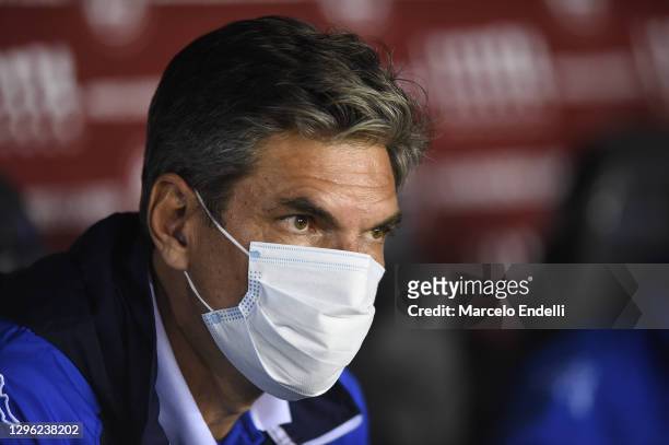 Mauricio Pellegrino head coach of Velez Sarsfield wearing a protective mask looks on during a semifinal second leg match between Lanus and Velez as...