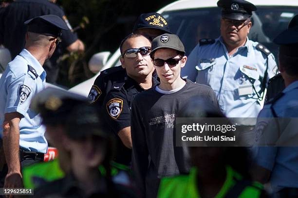 Gilad Shalit takes a walk outside his home on October 19, 2011 in Mitzpe Hila, Israel. Shalit was freed yesterday after being held captive for five...