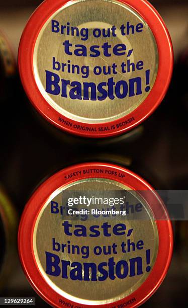 Jars of Branston pickle, manufactured by Premier Foods Plc, sit on display at a supermarket in London, U.K., on Tuesday, Oct. 18, 2011. U.K....