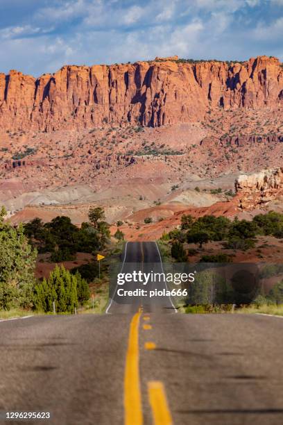 straight highway roads in usa southwest desert landscapes: road trip - capitol reef national park stock pictures, royalty-free photos & images