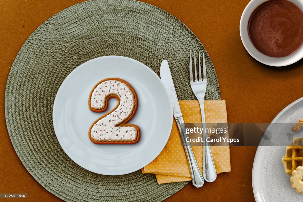 Number 2 cookie in a plate