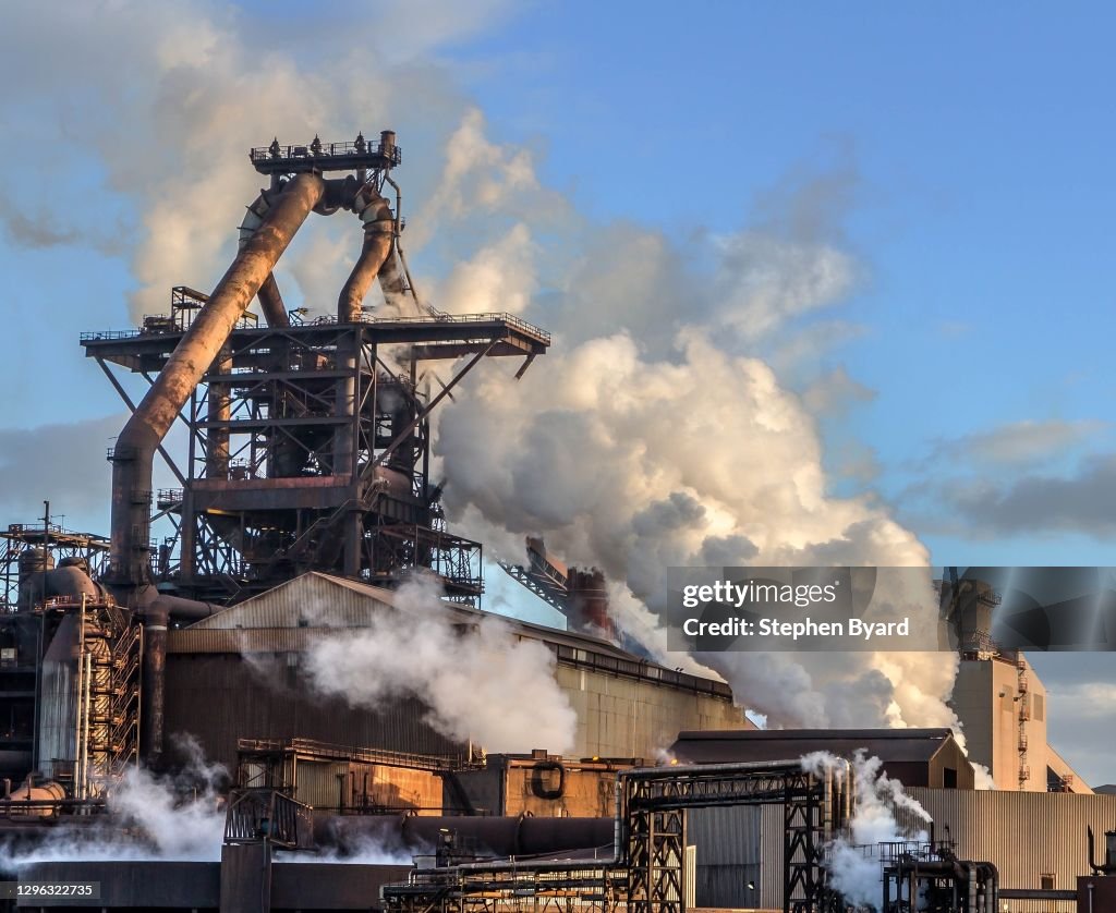 Steelworks with smoke and steam