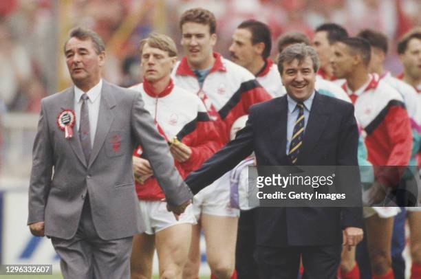 Tottenham Hotspur manager Terry Venables and Nottingham Forest manager Brian Clough lead the teams out hand in hand before the 1991 FA Cup Final...
