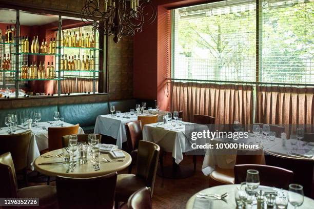 tables set in restaurant - fine furniture ストックフォトと画像