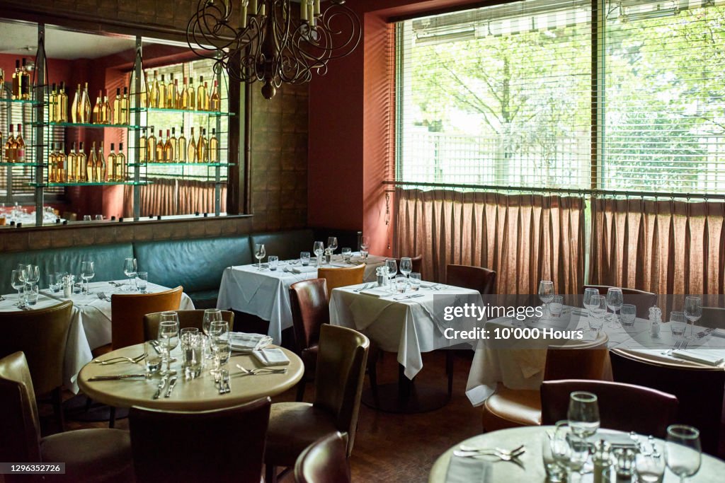 Tables set in restaurant