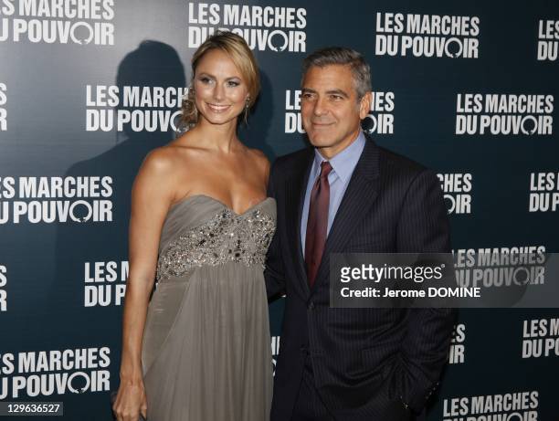 Stacy Keibler and George Clooney attend 'The Ides of March' Paris Premiere at Cinema UGC Normandie on October 18, 2011 in Paris, France.