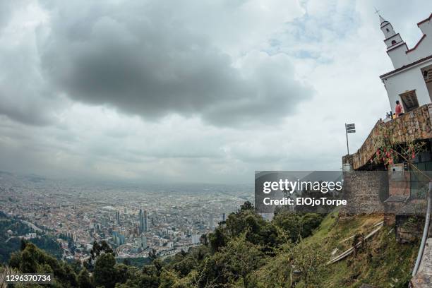 high angle view of bogot�á city, view from cerro monserrate, colombia - monserrate bogota stock pictures, royalty-free photos & images