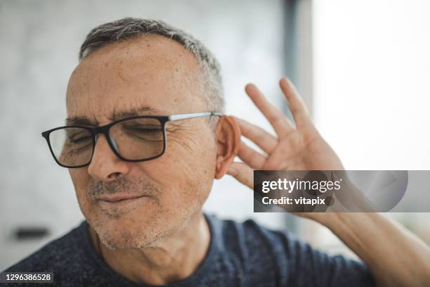 hearing issues - bad stock pictures, royalty-free photos & images