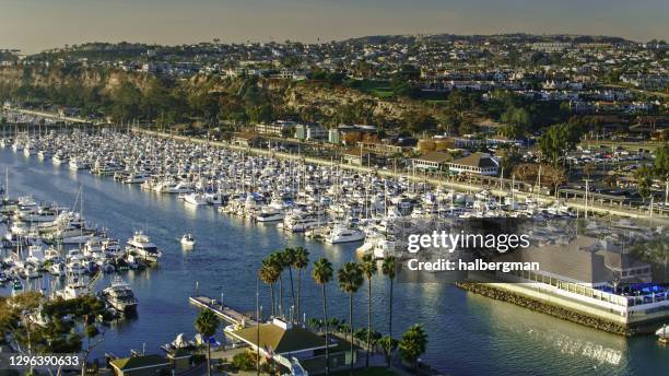 dana point marina at sunset - aerial - dana point stock pictures, royalty-free photos & images