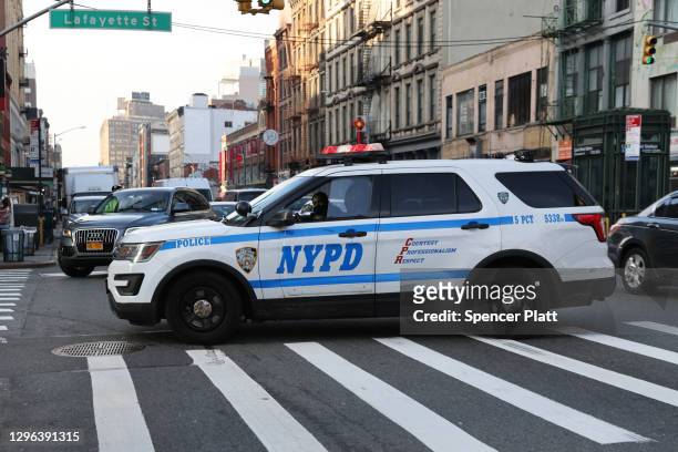 Police car drives through Manhattan on January 14, 2021 in New York City. In an announcement on Thursday, New York’s Attorney General Letitia James...