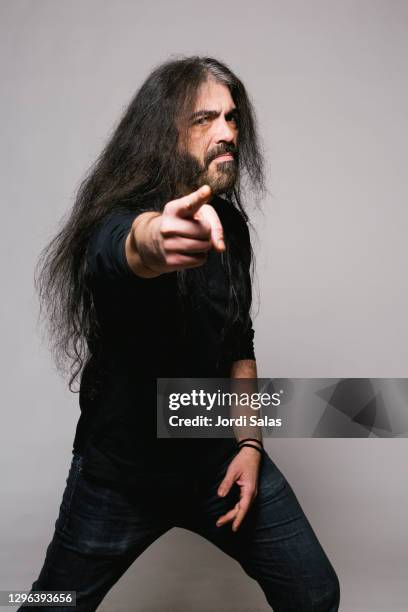 Metal Rocker Male Rocker Hairstyles For Men Photos and Premium High Res Pictures - Getty ...