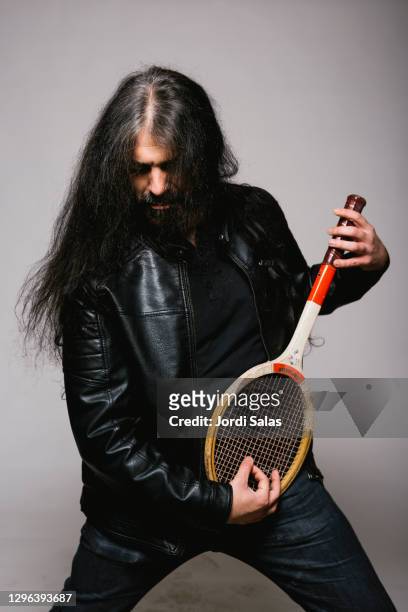 long hair adult man with a tennis racket - hairy back man stock pictures, royalty-free photos & images