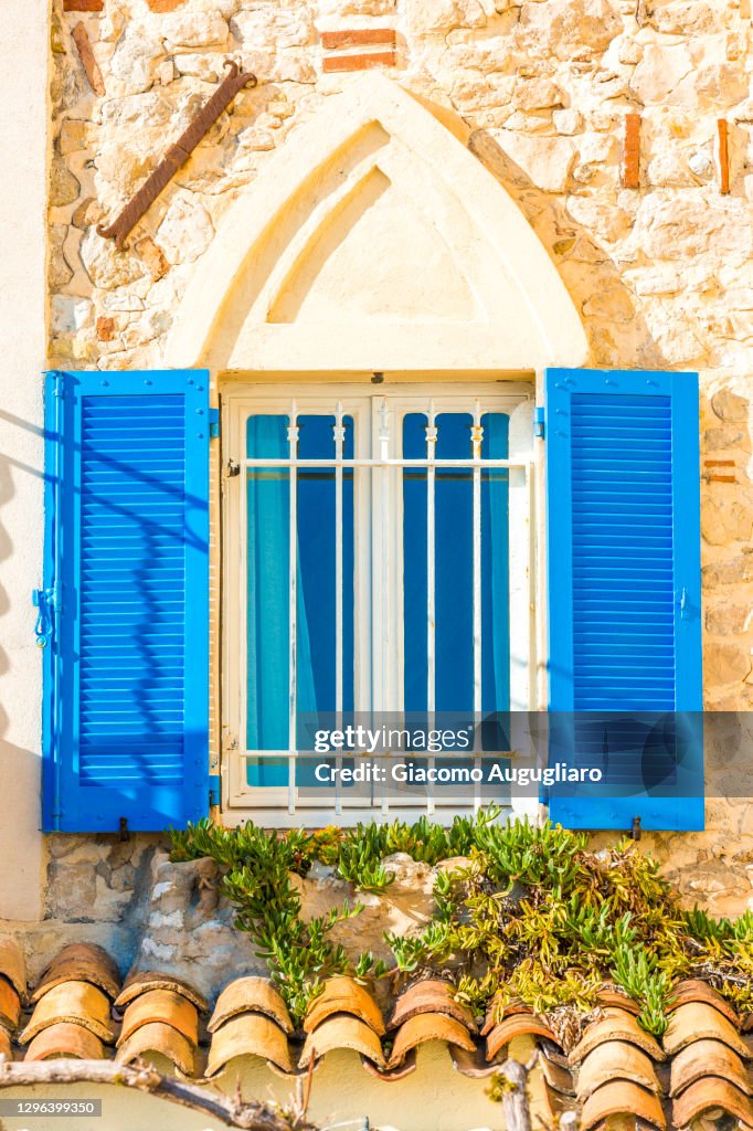 Pretty picturesque window in Antibes town, Alpes-Maritimes department, Provence Alpes Cote d'Azur, France