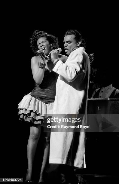 Singer and songwriter Angela Winbush and singer Ronald Isley of The Isley Brothers performs at the Arie Crown Theater in Chicago, Illinois in March...