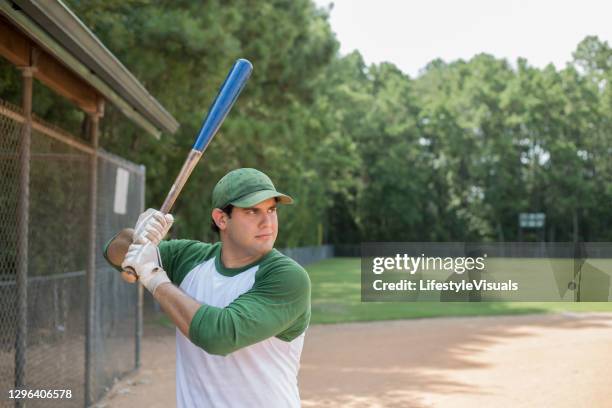 baseball season is here.  batter up. - baseball bat swing stock pictures, royalty-free photos & images