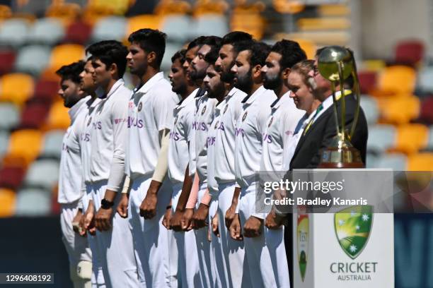 Indian players sing the Indian national anthem during day one of the 4th Test Match in the series between Australia and India at The Gabba on January...